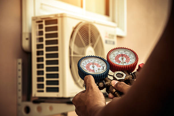 Professional Heat Pump Repair technician working in Wathena, KS